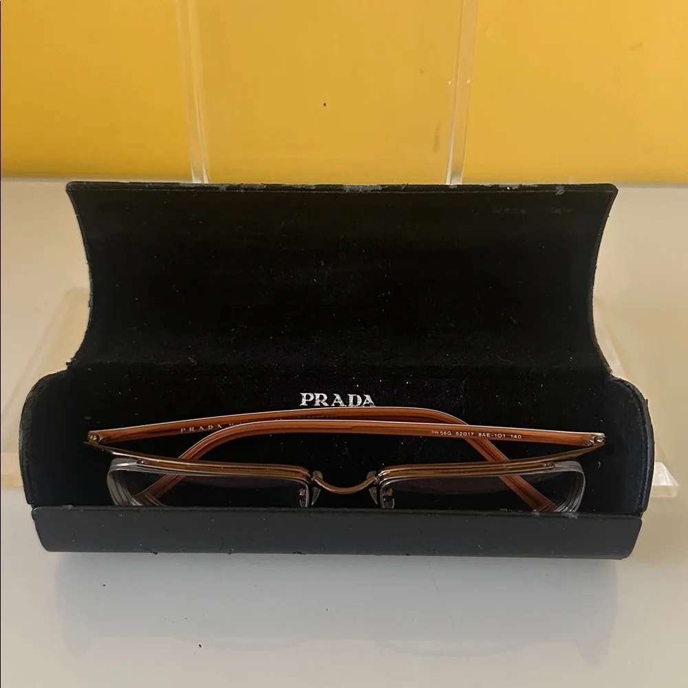 Prada Sleek Bronze Titanium Frameless Rectangular Prescription Glasses Frame